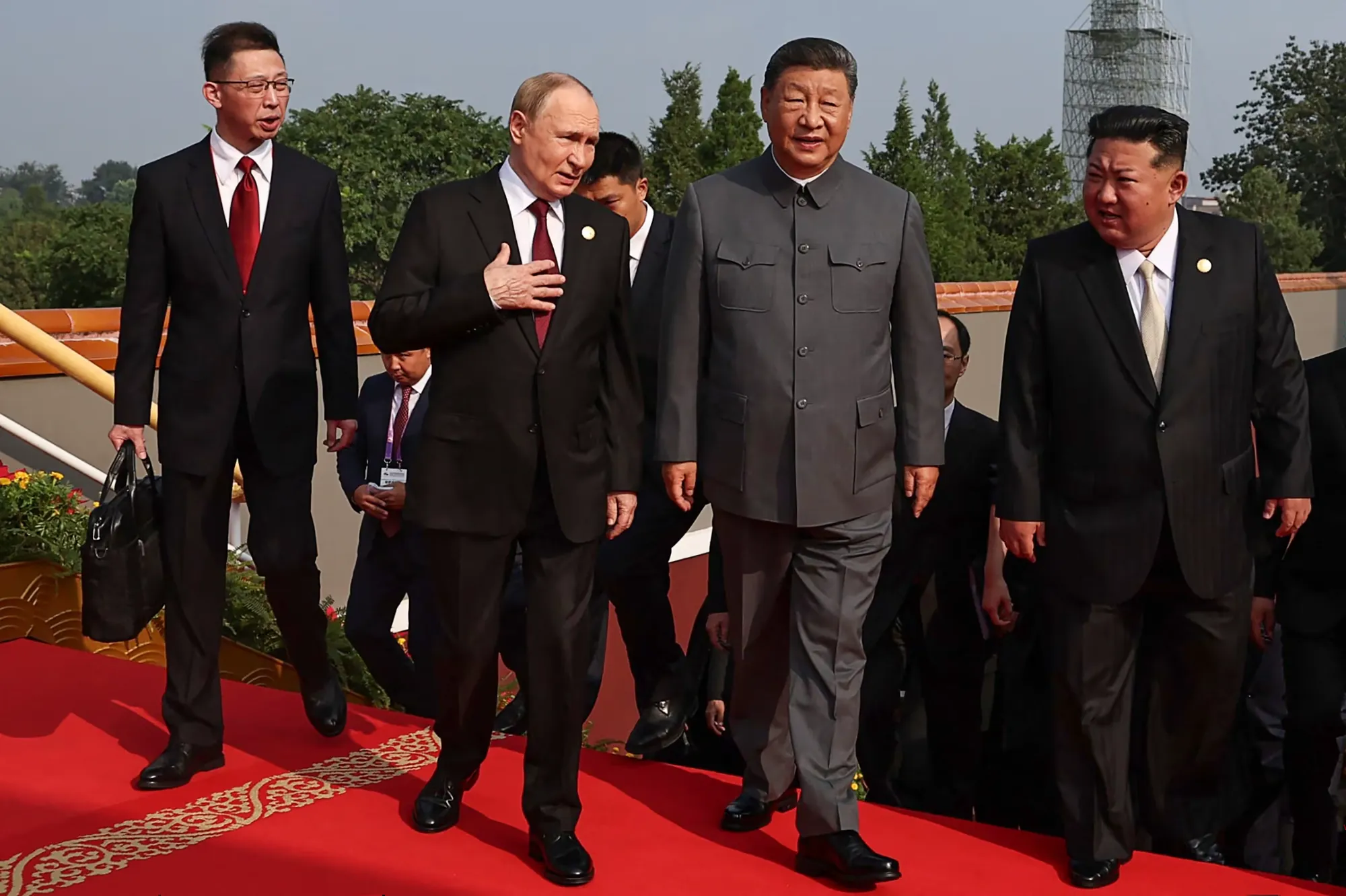 Heads of state of Russia, China and the DPRK walking together at a state event in Beijing, September 2025